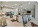 Eat-in kitchen with island, stainless steel appliances, and ample cabinet space at 4952 Surfside Cir, Bradenton, FL 34211