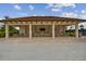Community covered patio with tables and chairs at 4952 Surfside Cir, Bradenton, FL 34211