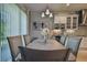 Casual dining area with table and chairs, offering access to the backyard at 4952 Surfside Cir, Bradenton, FL 34211