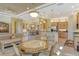 Casual dining area with round table and chairs near kitchen at 1130 Cielo Ct, North Venice, FL 34275
