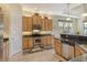 Modern kitchen with stainless steel appliances and granite countertops at 1130 Cielo Ct, North Venice, FL 34275