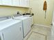 Convenient laundry room with washer and dryer at 1130 Cielo Ct, North Venice, FL 34275