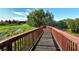 Scenic boardwalk path over wetlands, offering peaceful nature views at 1130 Cielo Ct, North Venice, FL 34275