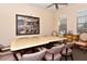 Community room with large table and chairs, perfect for gatherings at 1130 Cielo Ct, North Venice, FL 34275