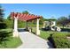 playground with covered seating and pergola at 1130 Cielo Ct, North Venice, FL 34275