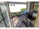 Screened patio with built-in grill and brick pavers at 1130 Cielo Ct, North Venice, FL 34275