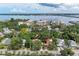 Stunning aerial view of the neighborhood with waterfront views and lush greenery at 1533 1St Ave W Dr, Bradenton, FL 34205