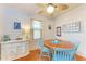 Bright dining room with hardwood floors, a round wood table, and stylish decor at 1533 1St Ave W Dr, Bradenton, FL 34205