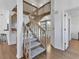 Wood staircase with carpet runner leading upstairs at 3125 57Th Avenue E Cir, Bradenton, FL 34203
