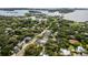 Aerial view showcasing the neighborhood, waterfront access, and the home's proximity to the bay at 3464 Camino Real, Sarasota, FL 34239