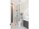 Contemporary bathroom showcasing a glass shower, sleek vanity, and elegant fixtures at 3464 Camino Real, Sarasota, FL 34239