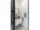 Stylish powder room with modern vanity, decorative fish accents, and contemporary design at 3464 Camino Real, Sarasota, FL 34239