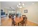 Open concept dining room featuring hardwood floors and views to the living room at 4532 Shark Dr, Bradenton, FL 34208