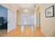 Bright and inviting foyer features beautiful hardwood floors and elegant double doors at 4532 Shark Dr, Bradenton, FL 34208
