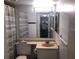 Clean bathroom with shower, toilet and vanity at 3271 Beneva Rd # 204, Sarasota, FL 34232
