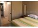 Bedroom with a double bed and adjacent bathroom at 3271 Beneva Rd # 204, Sarasota, FL 34232