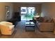 Living room with sliding glass doors and seating area at 3271 Beneva Rd # 204, Sarasota, FL 34232
