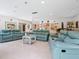 Bright living room with ample seating and access to kitchen at 302 Mendez Dr, Sarasota, FL 34243