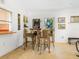 Cozy dining area with a small table and four chairs at 302 Mendez Dr, Sarasota, FL 34243