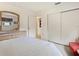 Serene bedroom with a queen-size bed and built-in closet at 302 Mendez Dr, Sarasota, FL 34243