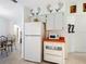 Bright kitchen with white cabinets and microwave at 302 Mendez Dr, Sarasota, FL 34243
