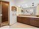 Clean bathroom with a shower and a double vanity at 302 Mendez Dr, Sarasota, FL 34243