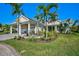 House exterior with landscaping and palm trees at 536 Regatta Way, Bradenton, FL 34208