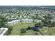 Aerial view of building and surrounding golf course at 3790 Pinebrook Cir # 105, Bradenton, FL 34209