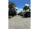 Paved driveway leads to charming beachfront homes, creating a welcoming community atmosphere at 1603 Gulf N Dr # 5, Bradenton Beach, FL 34217