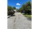 Residential street view with lush landscaping at 1603 Gulf N Dr # 5, Bradenton Beach, FL 34217