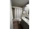 Updated bathroom with granite vanity and tub shower combo at 1603 Gulf N Dr # 5, Bradenton Beach, FL 34217