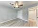 Spacious bedroom featuring wood-look floors and ample closet space at 515 30Th W Ave # H201, Bradenton, FL 34205