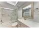 Updated bathroom with marble tile shower and vanity at 515 30Th W Ave # H201, Bradenton, FL 34205