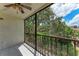 Private screened balcony overlooking lush landscaping at 515 30Th W Ave # H201, Bradenton, FL 34205