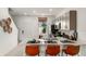 Modern kitchen with stainless steel appliances and an island with seating at 8613 Daybreak St, Sarasota, FL 34241
