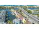 Waterfront view of shops and restaurants at 1644 Stickney Point Rd # 102, Sarasota, FL 34231