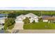 Two-story home with tile roof and a large yard at 4323 Rock Creek Dr, Port Charlotte, FL 33948