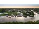 Waterfront property aerial view, showcasing the home's size and canal access at 4323 Rock Creek Dr, Port Charlotte, FL 33948