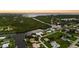 Aerial view of waterfront home nestled in a quiet neighborhood at 4323 Rock Creek Dr, Port Charlotte, FL 33948