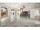 Spacious living area with marble floors and high ceilings at 4323 Rock Creek Dr, Port Charlotte, FL 33948