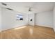 Bedroom with hardwood floors and a window with a view at 4323 Rock Creek Dr, Port Charlotte, FL 33948