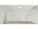 Simple bedroom with marble floors and plenty of natural light at 4323 Rock Creek Dr, Port Charlotte, FL 33948