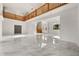 High-ceiling great room with marble floors and a stunning staircase at 4323 Rock Creek Dr, Port Charlotte, FL 33948