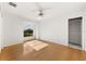 Light and airy bedroom with hardwood floors and large window at 4323 Rock Creek Dr, Port Charlotte, FL 33948