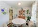 Bright dining area with a round table and four chairs, plus built-in hutch at 1410 21St W St, Bradenton, FL 34205