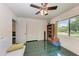 Spacious home office with a couch, built-in shelving, and window at 1410 21St W St, Bradenton, FL 34205