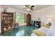 Home office featuring a couch, bookshelves, and large window at 1410 21St W St, Bradenton, FL 34205