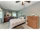 Bedroom with a bed, dresser, and a ceiling fan at 1410 21St W St, Bradenton, FL 34205