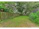 Private backyard with lush landscaping at 1410 21St W St, Bradenton, FL 34205