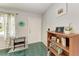Bright and airy entryway with tiled floor, storage shelving, and entry door at 1410 21St W St, Bradenton, FL 34205